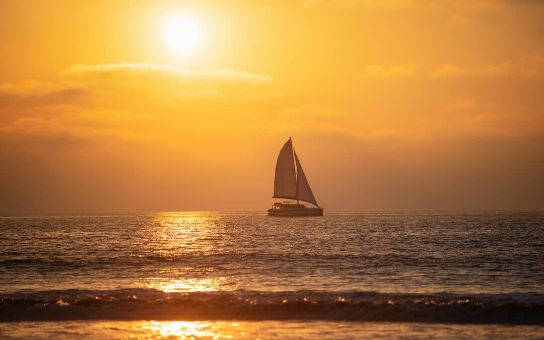 Sailboat At Sea. Seascape Golden Sunrise Over The Sea. Nature La